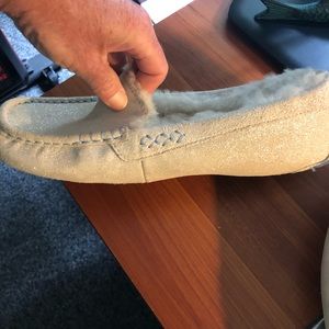 Size nine women’s Ugg slippers.